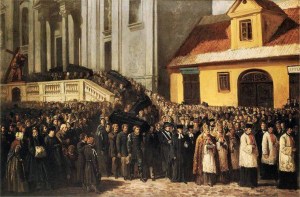 Trumny znoszone są ze stopni kościoła Świętego Krzyża.